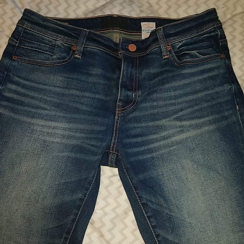 Buckle Skinny Jeans